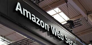 Sign displaying Amazon Web Services at a trade show