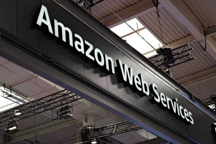 shutterstock_2706445369.jpg Sign displaying Amazon Web Services at a trade show