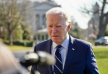 man in tie, outside white house