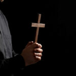 Exorcists Demand Global Network—Vatican Stalls priest with cross
