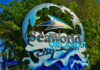 Sign for SeaWorld Orlando featuring a dolphin and wave design