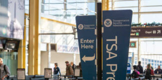 Signage indicating TSA PreCheck entrance at an airport