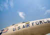 Close-up view of a U.S. Air Force aircraft against a blue sky
