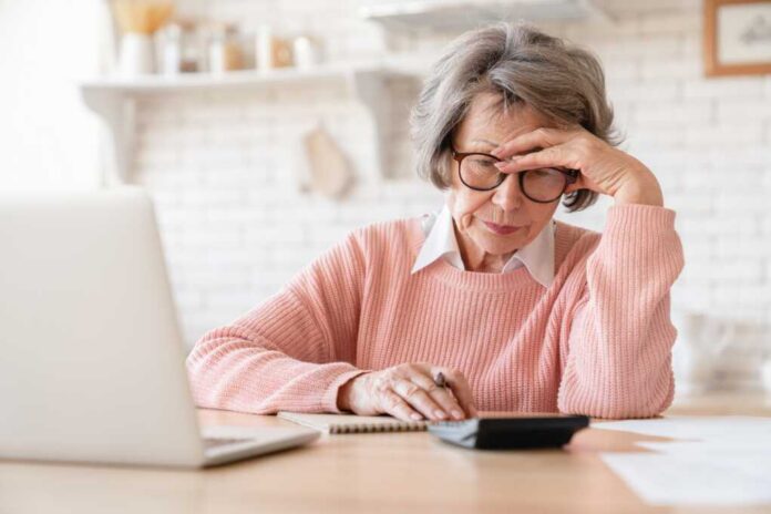 senior woman using laptop_2411088901.jpg senior