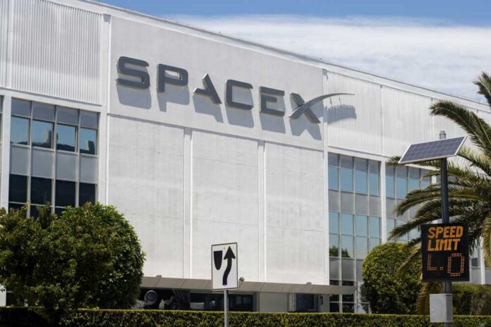 Exterior view of the SpaceX headquarters building with a speed limit sign