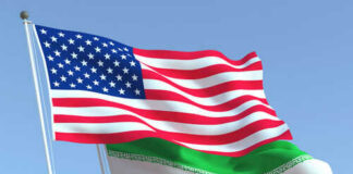 American and Iranian flags waving in the sky.