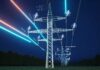 SHOCK MERGER: AI Power Play Hits Households High-voltage transmission tower at night with glowing data overlays