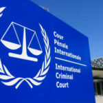 International Criminal Court sign with scales of justice.