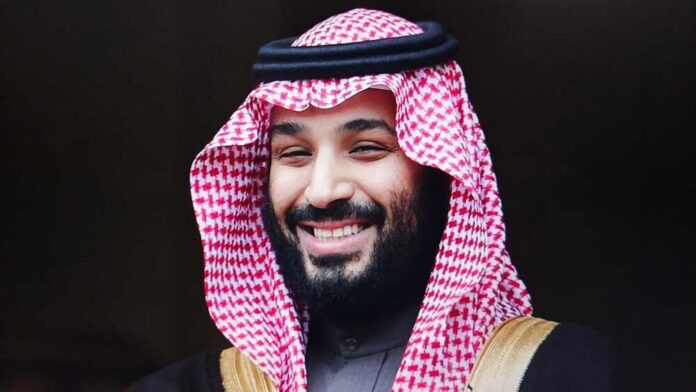 Saudi,Arabias,Crown,Prince,Mohammed,Bin,Salman,Smiles,Broadly,,Wearing A man in traditional Saudi attire smiling at the camera