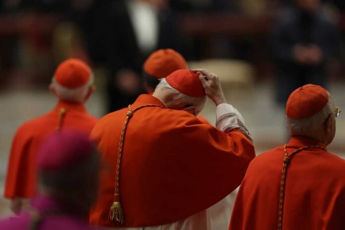 Vatican,City,-,Itay,,December,31,,2025:,Cardinal,Wears,Red Cardinals in red robes participating in a religious ceremony