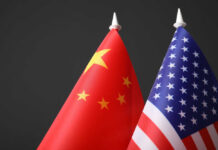 Chinese and American flags side by side.