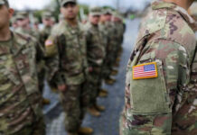 $1T Pentagon Bill Promises Power—Raises Oversight Fears Military personnel standing in formation outdoors