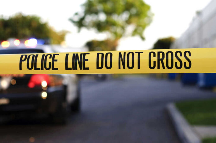 Yellow police tape with text police line do not cross