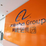 U.S. AI Drained? Anthropic Points At Alibaba Scales of justice decal on glass at modern office building