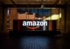 Tax Bills Next? Amazon’s Big Bet Illuminated Amazon logo on a building at night