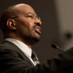 Establishment Cracks—Van Jones Sounds Alarm People holding campaign signs at a political rally
