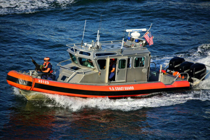 us-coast-guard-25ft-armed-defender-class-boat1174172665jpg U.S. Coast Guard patrol boat speeding across the water