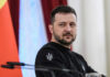 Ukraine’s Drone Play Rewires Europe man in black sweatshirt at a podium looking to the side