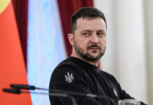 Ukraine’s Drone Play Rewires Europe man in black sweatshirt at a podium looking to the side