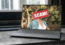 Laptop screen with a scam warning image.