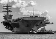 Kennedy Slips—Nimitz Dragged Back In
