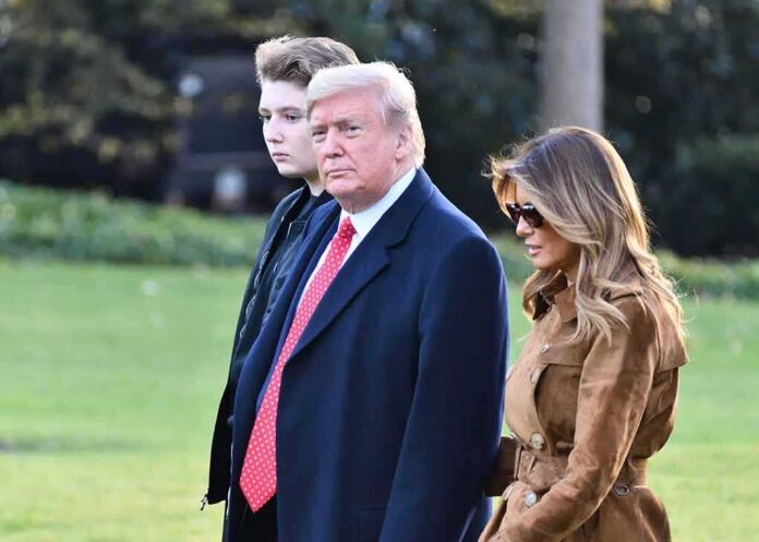 three people walking outdoors