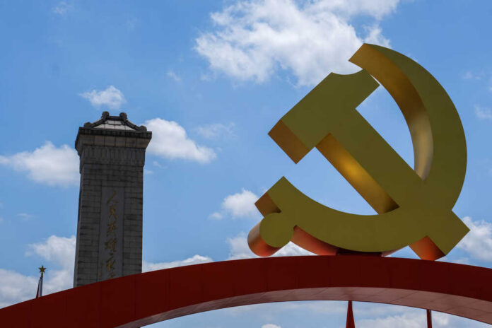 Beijing,China,-,July,3,2021:,Tiananmen,Square,During,The Person standing near a Chinese flag indoors