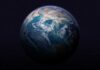 General Sounds Alarms Over Spacefight View of Earth from space with visible continents and clouds