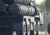 Turkey’s S-400 Shuffle Rattles Washington A military missile system positioned on a grassy field during sunset
