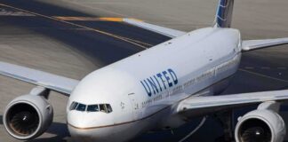 United Airlines Boeing 777 taxiing on airport tarmac