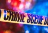 Repeat-Offender Rampage Shocks Bronx Crime scene tape with blurred emergency lights in background