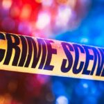 Repeat-Offender Rampage Shocks Bronx Crime scene tape with blurred emergency lights in background