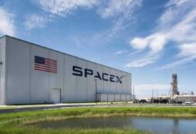 Gulf Coast Shake-Up: SpaceX Moves In SpaceX hangar beside launch pad under blue sky