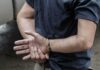 Kids at Risk—Why Were They Freed? person in handcuffs with hands behind back