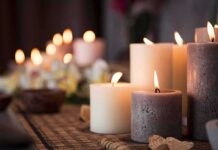 Mystery Crash Near Ancient Lines lit pillar candles on a woven mat