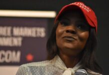 Widow’s Stop Shuts Down Candace Circus woman in a red cap holding a microphone