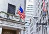 Ellison Plunges—Oracle Carnage Stuns Wall Street Facade of the New York Stock Exchange with an American flag and Wall Street sign