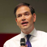 Marco Rubio speaking with a microphone