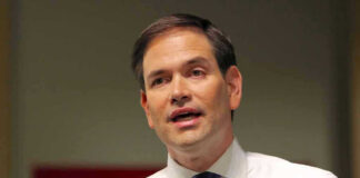 Marco Rubio speaking with a microphone