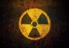 IAEA Shut Out – Iran Stockpile Mystery Deepens Radiation hazard symbol on a grungy surface