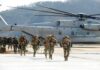 Ignored Sniper Alert — Abbey Gate Doomed Soldiers disembark and walk past a large military helicopter