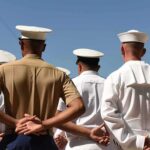 Counterfeit Oxy Flooded U.S. Warship sailors and marines standing in formation with hands behind backs
