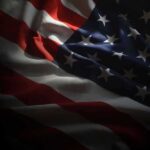 United States flag with stars and stripes in dramatic lighting