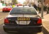 Mystery Trespasser Hits Harris’ Malibu Home Sheriff patrol car parked on city street