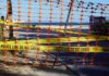 City Pulls Plug – Monster Surf Nukes Festival Weekend Orange safety net and yellow police tape blocking a beach access