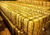 Geopolitics Jolt: Gold Leaves U.S., Canada Stacks of gold bars strapped together in a vault