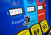 Pump Shock: Record Labor Day Prices Gas pump with prices and sticker on the Extra button
