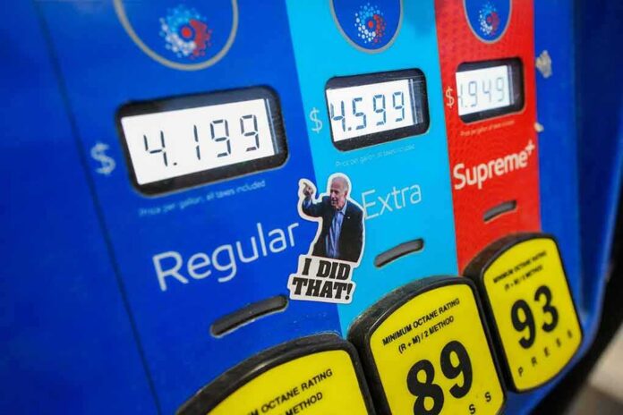 shutterstock_2132547057 Gas pump with prices and sticker on the Extra button