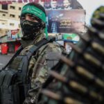 Top Hamas Boss GRABBED Alive armed person in camouflage and face covering on a city street