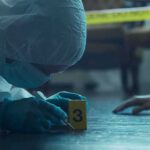 Pregnant Girlfriend Poisoned — Deadly Plot Exposed forensic investigator in protective suit examining crime scene markers